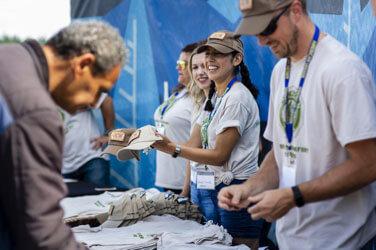 HawthorneTeam_TacomaBaseballGame_Table Wounded and recovering veterans enjoy a night at the ballpark